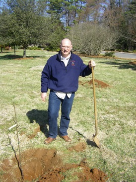 PAZ planting a pear tree.JPG