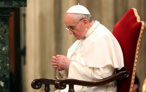 Francis prays rosary