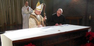 Abbot James receiving vows of Br Bernard